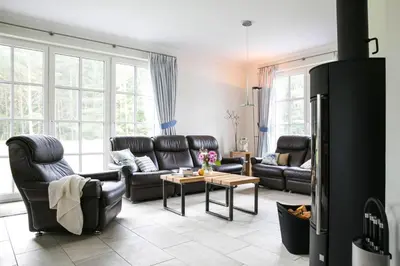 Ein Sitzbereich in der Unterkunft Ferienhaus in Fuhlendorf