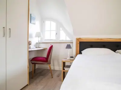 Ein Bett oder Betten in einem Zimmer der Unterkunft Ferienhaus, Fuhlendorf