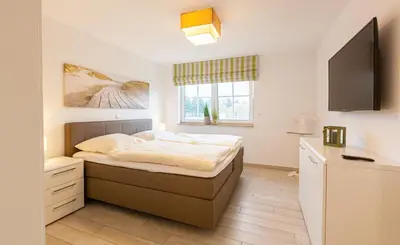 Ein Bett oder Betten in einem Zimmer der Unterkunft Seehase