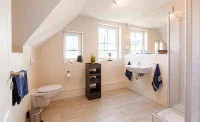Ein Badezimmer in der Unterkunft Seeigel