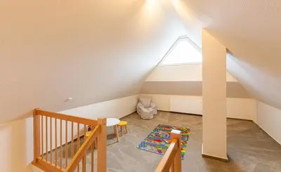 Ein Bett oder Betten in einem Zimmer der Unterkunft Seeteufel