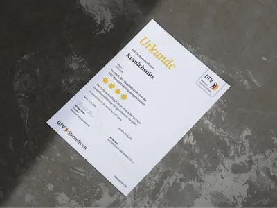 Ein Zertifikat, Auszeichnung, Logo oder anderes Dokument, das in der Unterkunft Bernsteinland Barth ausgestellt ist