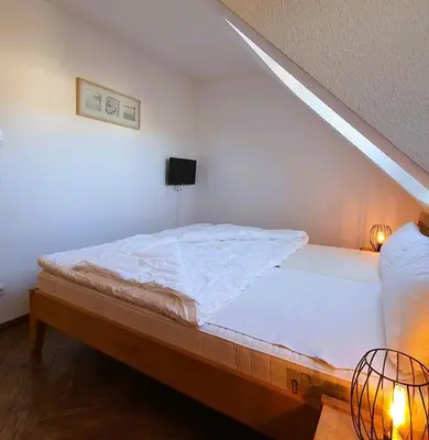 Ein Bett oder Betten in einem Zimmer der Unterkunft Fritz-Reuter-Str.