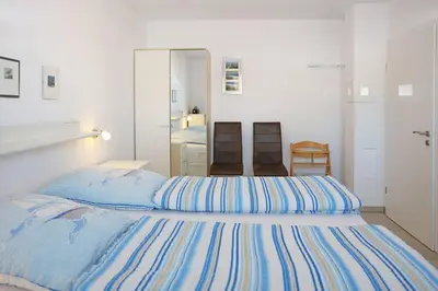 Ein Bett oder Betten in einem Zimmer der Unterkunft Haus Waldwiese