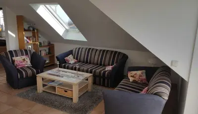 Ein Sitzbereich in der Unterkunft Parkresidenz am Hafen 15