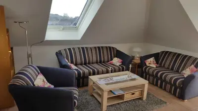 Ein Sitzbereich in der Unterkunft Parkresidenz am Hafen 15