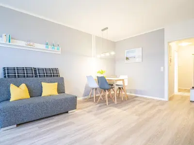Ein Sitzbereich in der Unterkunft Ferienwohnung Flaschenpost