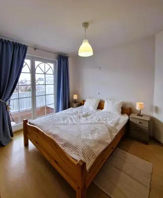 Ein Bett oder Betten in einem Zimmer der Unterkunft Fritz-Reuter-Str.