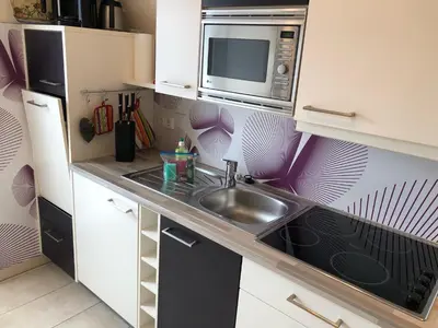 Küche/Küchenzeile in der Unterkunft Gartenweg 3 Haus Maritimus 