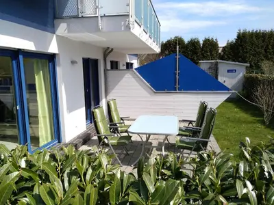 Ein Garten an der Unterkunft Gartenweg 3 Haus Maritimus Käptn's Perle