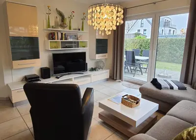 Ein Sitzbereich in der Unterkunft Gartenweg 3 Haus Maritimus Käptn's Perle