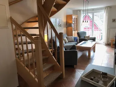 Ein Sitzbereich in der Unterkunft Glebbe 66 - Hus Sünnschien