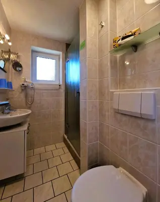 Ein Badezimmer in der Unterkunft Hägerende 
