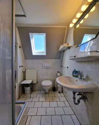 Ein Badezimmer in der Unterkunft Hägerende 