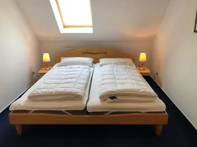 Ein Bett oder Betten in einem Zimmer der Unterkunft Hafenstr.22 Wohnung 7