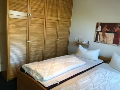 Ein Bett oder Betten in einem Zimmer der Unterkunft Hafenstr.22 A Wg.5
