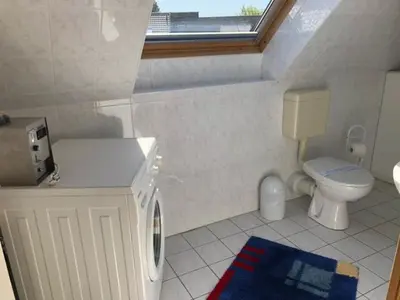 Ein Badezimmer in der Unterkunft Hafenstr.22 A Wg.5