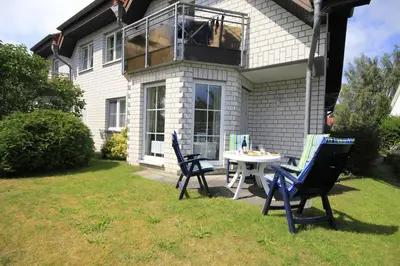 Ein Garten an der Unterkunft Birkenstr.14 a Whg.11