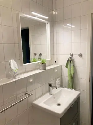 Ein Badezimmer in der Unterkunft Birkenstr.14 a Whg.11