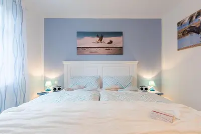 Ein Bett oder Betten in einem Zimmer der Unterkunft Hafenstr.27 
