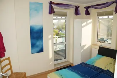 Ein Bett oder Betten in einem Zimmer der Unterkunft Hafenstr.35 Villa Verena