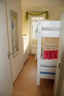 Ein Bett oder Betten in einem Zimmer der Unterkunft Hafenstr.35 Villa Verena
