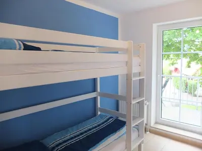 Ein Bett oder Betten in einem Zimmer der Unterkunft Haus Kranich 