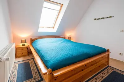 Ein Bett oder Betten in einem Zimmer der Unterkunft Haus Kranich 