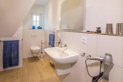 Ein Badezimmer in der Unterkunft Haus Kranichsruh Whg. 