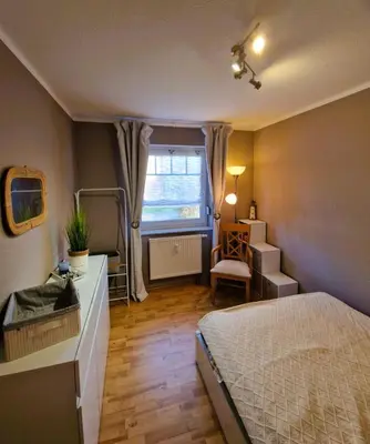Ein Bett oder Betten in einem Zimmer der Unterkunft Haus Sonne Whg.3