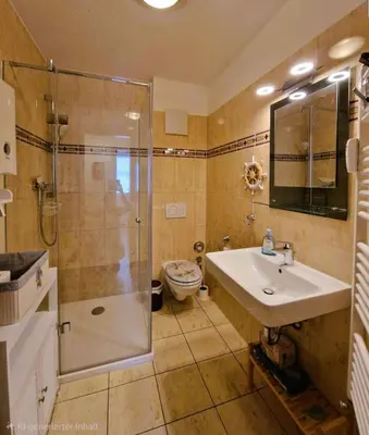 Ein Badezimmer in der Unterkunft Haus Sonne Whg.3