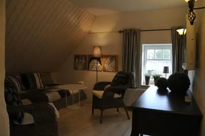 Ein Sitzbereich in der Unterkunft Traumfängerhaus Elfen