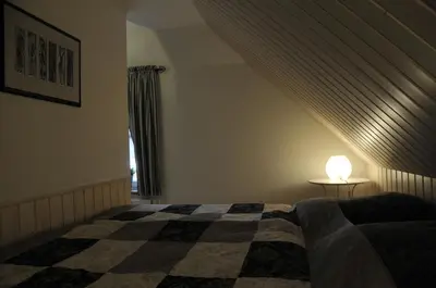 Ein Bett oder Betten in einem Zimmer der Unterkunft Traumfängerhaus Elfen