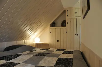 Ein Bett oder Betten in einem Zimmer der Unterkunft Traumfängerhaus Engel