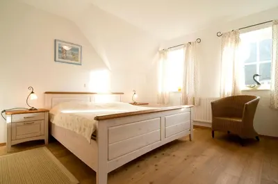 Ein Bett oder Betten in einem Zimmer der Unterkunft Ferienhaus Zander mit Sauna