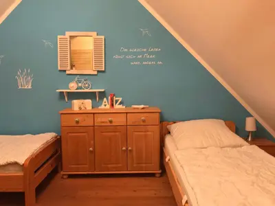 Ein Bett oder Betten in einem Zimmer der Unterkunft Ferienhaus Zander mit Sauna