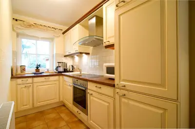 Küche/Küchenzeile in der Unterkunft Ferienhaus Zander mit Sauna