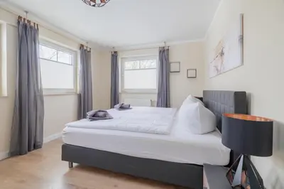Ein Bett oder Betten in einem Zimmer der Unterkunft Boddenkieker 14