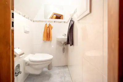 Ein Badezimmer in der Unterkunft Das DÜNENHAUS
