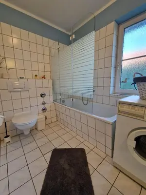Ein Badezimmer in der Unterkunft Martha-Müller-Grählert-Weg 7/8 Whg.6
