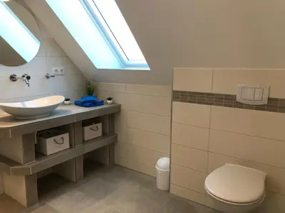 Ein Badezimmer in der Unterkunft Pension Windrose