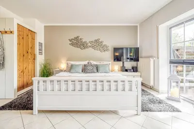 Ein Bett oder Betten in einem Zimmer der Unterkunft Kavelweg 43 EG Wohnung