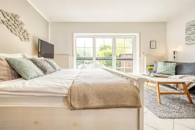 Ein Bett oder Betten in einem Zimmer der Unterkunft Kavelweg 43 EG Wohnung
