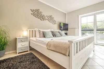 Ein Bett oder Betten in einem Zimmer der Unterkunft Kavelweg 43 EG Wohnung