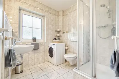 Ein Badezimmer in der Unterkunft Kavelweg 43 OG