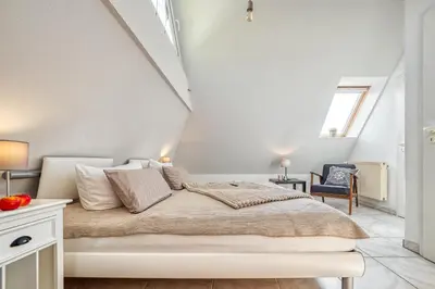 Ein Bett oder Betten in einem Zimmer der Unterkunft Kavelweg 43 OG