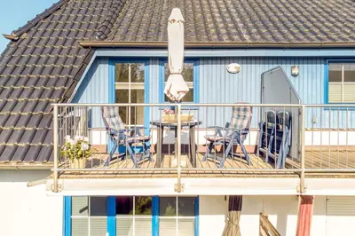 Ein Balkon oder eine Terrasse in der Unterkunft Kavelweg 43 OG