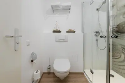 Ein Badezimmer in der Unterkunft 5-Sterne-Ferienapartment Dünensand direkt am Kurstrand