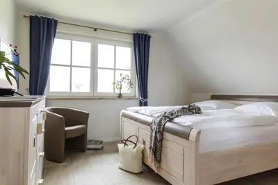 Ein Bett oder Betten in einem Zimmer der Unterkunft Holiday house, Fuhlendorf