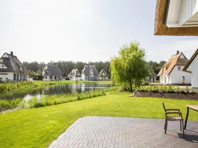 Ein Garten an der Unterkunft Komfortables Ferienhaus mit Sauna in Fuhlendorf